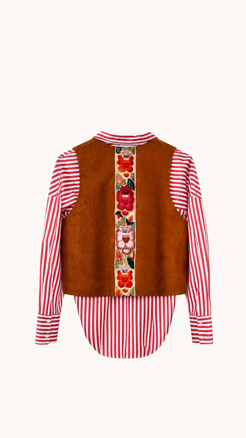 A women's long-sleeve blouse shown from the back, featuring red and white vertical stripes on the sleeves and hem, a brown suede-like central panel, and a vertical floral embroidered stripe down the middle.