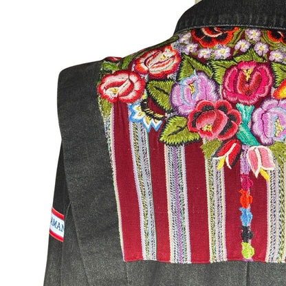 Gray denim jacket with colorful floral embroidery on a white background